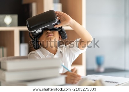 Similar – Image, Stock Photo Child in VR headset playing on couch