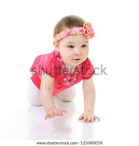 full legth portrait of cute happy smiling crawling little girl toddler, 10 month, studio over white