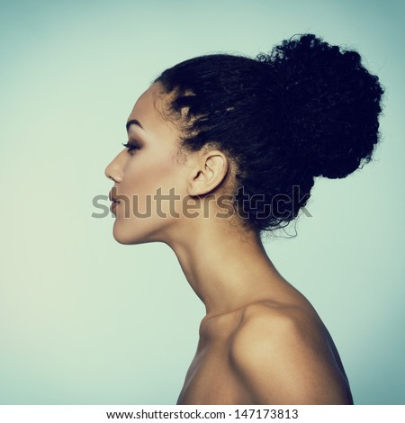 Beauty portrait of young fresh fashion woman in profile, toned