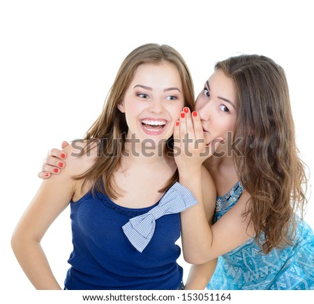 woman\'s secret, two young beautiful women friends whisper funny news