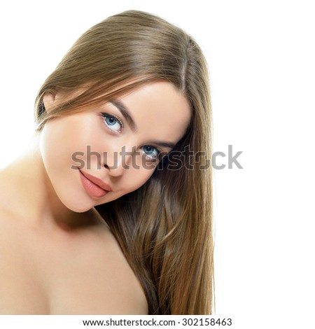 Beauty portrait of young woman with beautiful healthy face and long fair hair. Attractive girl over white. Health care, skin care, beauty treatment, cosmetology, youth and aging concept.