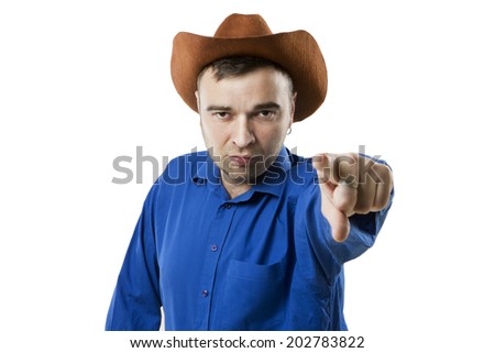 impressive solid cowboy stares into the camera and points to you. Wild wild West