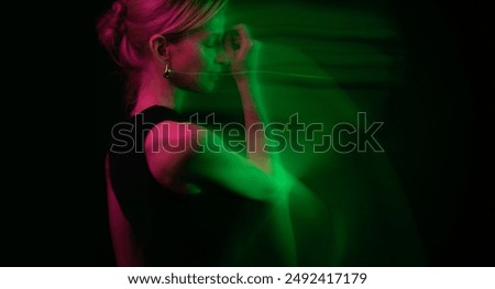 Similar – Image, Stock Photo Moody portrait in orange tones of a white woman