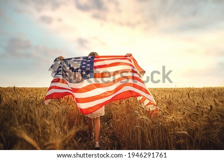 Similar – Image, Stock Photo American woman with flag sitting on road