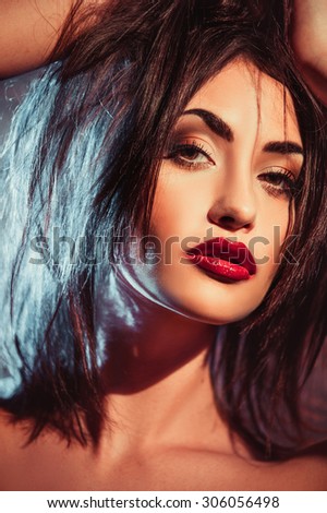 Beauty fashion dark hairy model with red lips