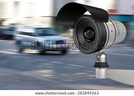 close-up of a security camera in city traffic
