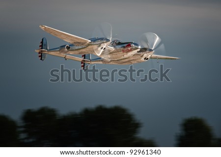 RADOM, POLAND - AUGUST 28: Red Bull P-38 Lightning takes off for its show during Air Show Radom on August 28, 2011