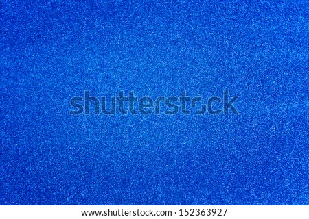 Abstract dark blue glitter background