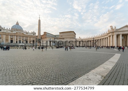 VATICAN, ROME, ITALY - MARCH 21, 2015: People on the Saint Peter\'s Square at Vatican that world center of catholic religion, March 21, 2015