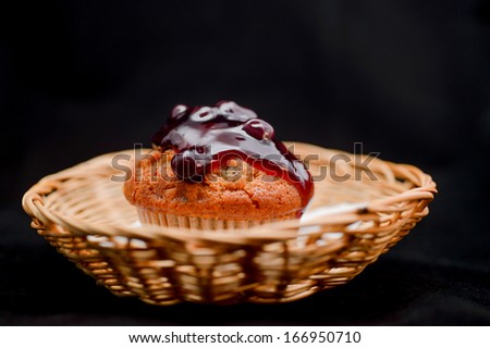 Blueberry cupcake on white background