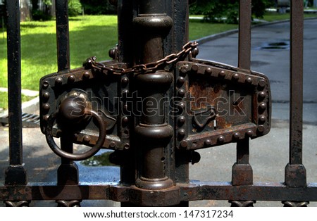 Similar – Image, Stock Photo old closed garden gate with wire mesh fence and hole