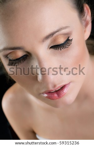 Beautiful woman, blue eyes. Can be used for makeup artist services, woman health and beauty supply companies, spa & body care services, woman magazines. Focus is on eyes and nose.