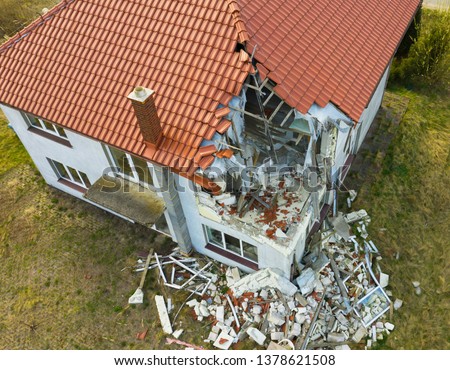 Similar – Image, Stock Photo View from a destroyed window onto old factory buildings. In this lost place, nature reclaims what was taken from it.