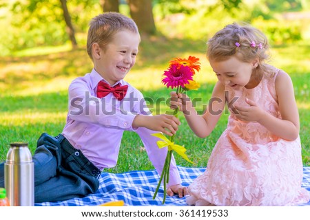 Similar – Image, Stock Photo Little boy with flower in the hands