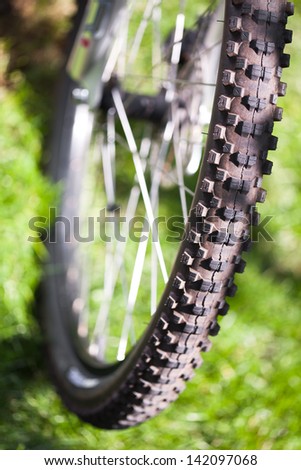 Bicycle in the grass, close up photo