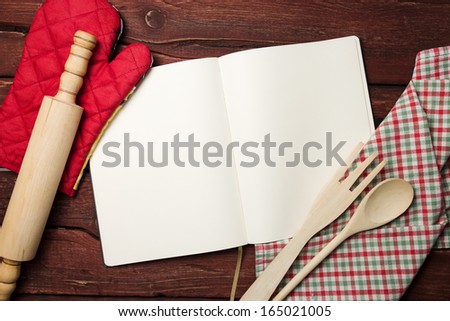 Blank recipe book on wooden table