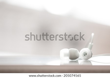 White earphones, close up photo, small dof