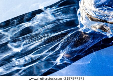 Similar – Image, Stock Photo Glasses of whiskey casting shadows on table