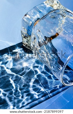 Similar – Image, Stock Photo Glasses of whiskey casting shadows on table