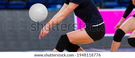 Volleyball game sport with group of girls indoor in sport arena. Professional sport concept