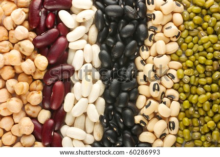 The ranks of different beans: kidney, mung, chickpea, black eye, preto. View from above.