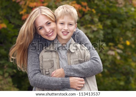 Happy mother and son in  park