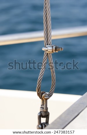 Detail of fastening of a cable on the sea boat.