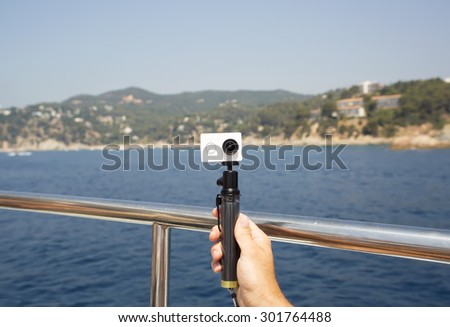 Camera photo selfie by the sea boat