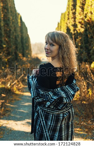 woman leaves yellow alley outdoors