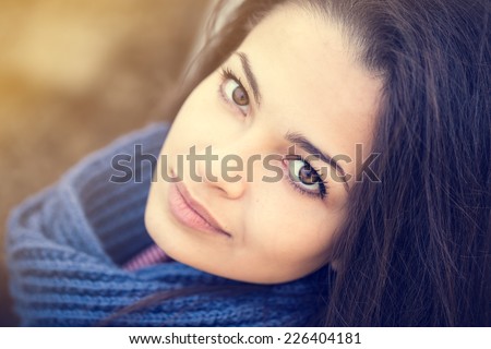 beautiful brunette woman portrait blue scarf