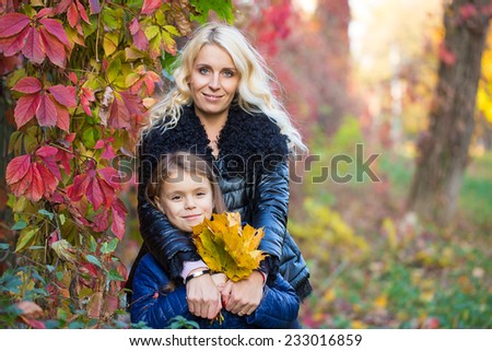 Mom daughter autumn walk family