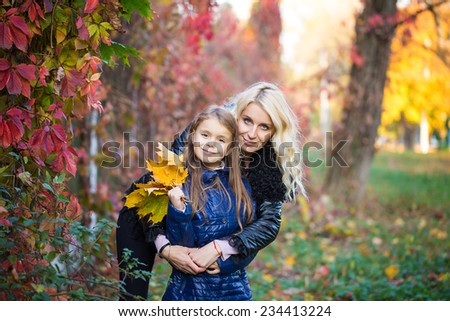 Mom daughter autumn walk family