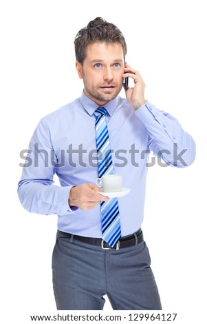Office clerk with cup,saucer and mobile phone on white background