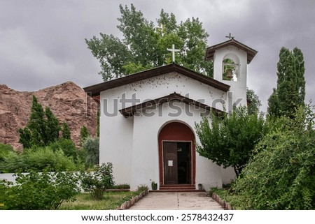 Similar – Image, Stock Photo Small village located in mountainous terrain