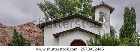Similar – Image, Stock Photo Small village located in mountainous terrain