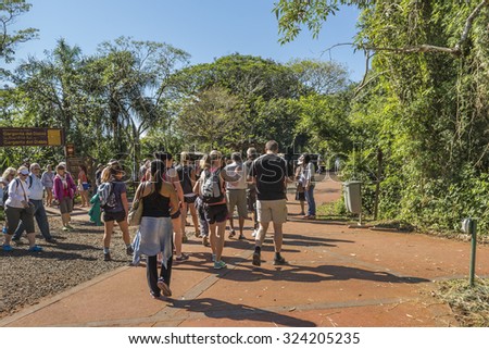 PORT IGUAZU, ARGENTINA, MARCH - 2015 - People to abroad the train to Devil Throat at Iguazu Falls in Argentina.