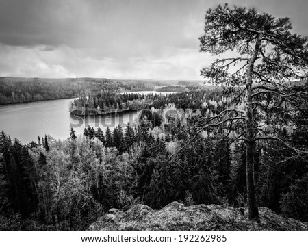 Dramatic lake view in black & white at the Aulanko nature conservation park in Finland