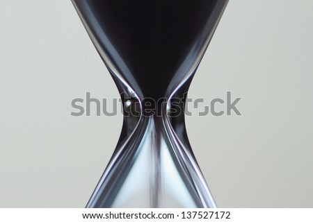 black hourglass macro with clear background