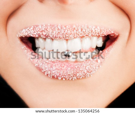 Smile like sugar.Pierced tongue and beautiful white teeth.