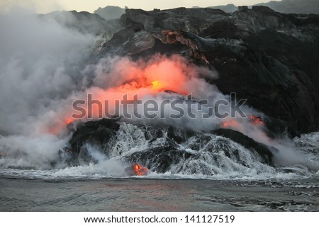 Lava flowing  into Pacific Ocean on Big Island, Hawaii
