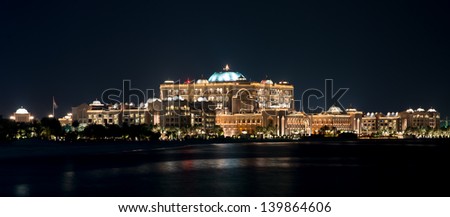 ABU DHABI, UAE - MAY 1: Panorama of Emirates Palace hotel on May 1, 2013. Emirates Palace is a luxurious and the most expensive 7 star hotel designed by renowned architect, John Elliott RIBA.