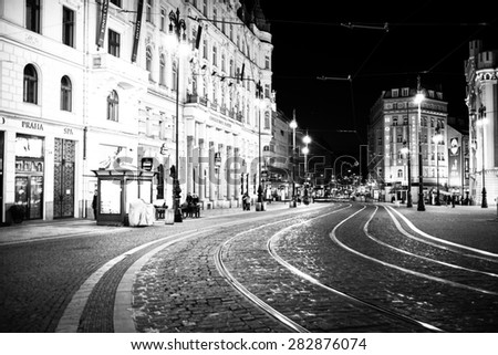 Streets of the old town Prague with tram lines, in black and white high contrast