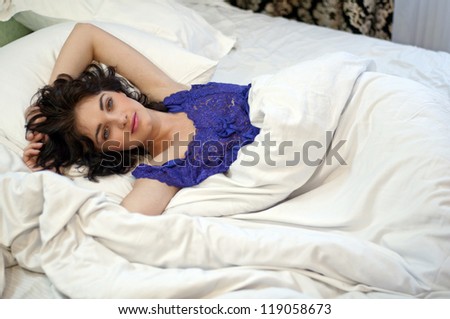 young pretty woman ls in bed