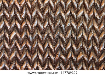Closeup of a Brown Woven Basket with Chevron Pattern