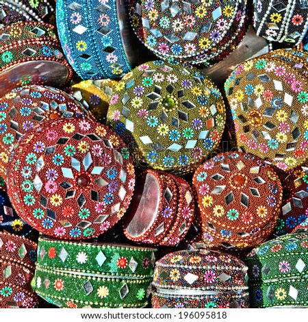 Variety of samples of different bright, colorful jewel boxes in oriental style. A street bazaar at a flea market in Tel Aviv. Israel