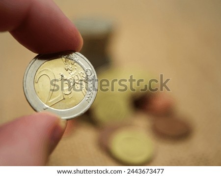 Similar – Image, Stock Photo Two euros Euro two € Money