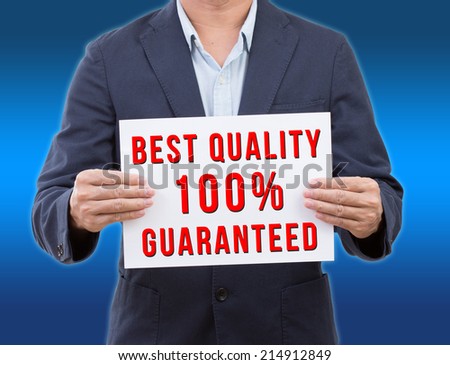 Business man holding best quality banner