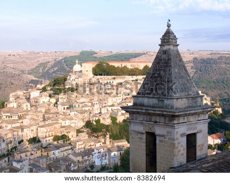 Bell tower and landscape for picturesque village of Ragusa