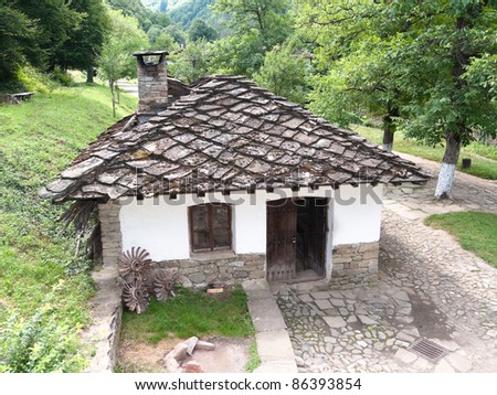 traditional house with roof stone in the architectural-ethnographic village of Etar, Bulgaria
