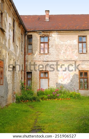 backyard and aged facade of old house in Pljevlja, Montenegro